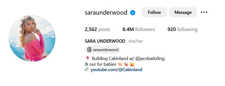 outdoor portrait on Sara Underwood’s Insta profile showing her in pink