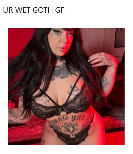 tattooed goth model in black lace lingerie with red lighting, Angel Summer