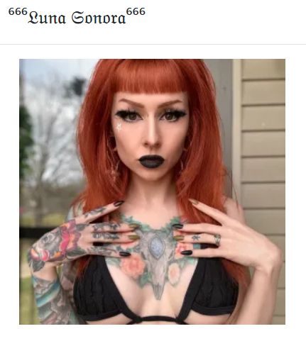 bright red hair, black lipstick, and chest tattoos in black top, Luna Sonora